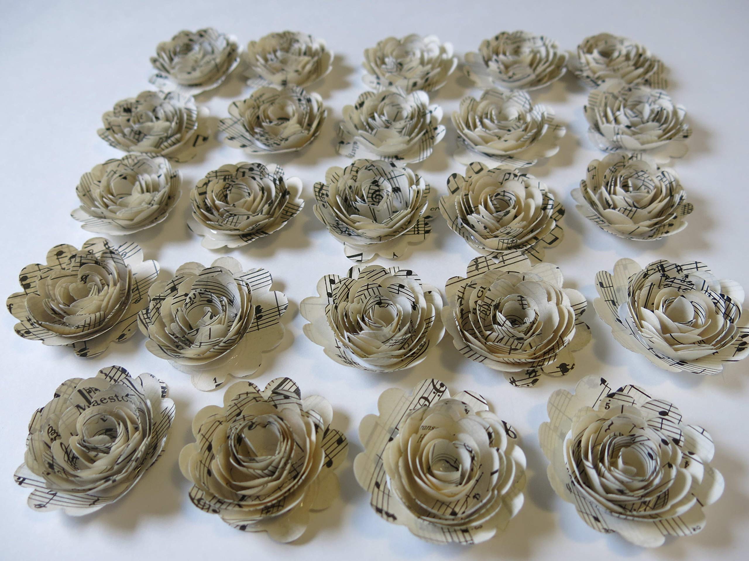 Weddings and showers decoration using sheet music flowers