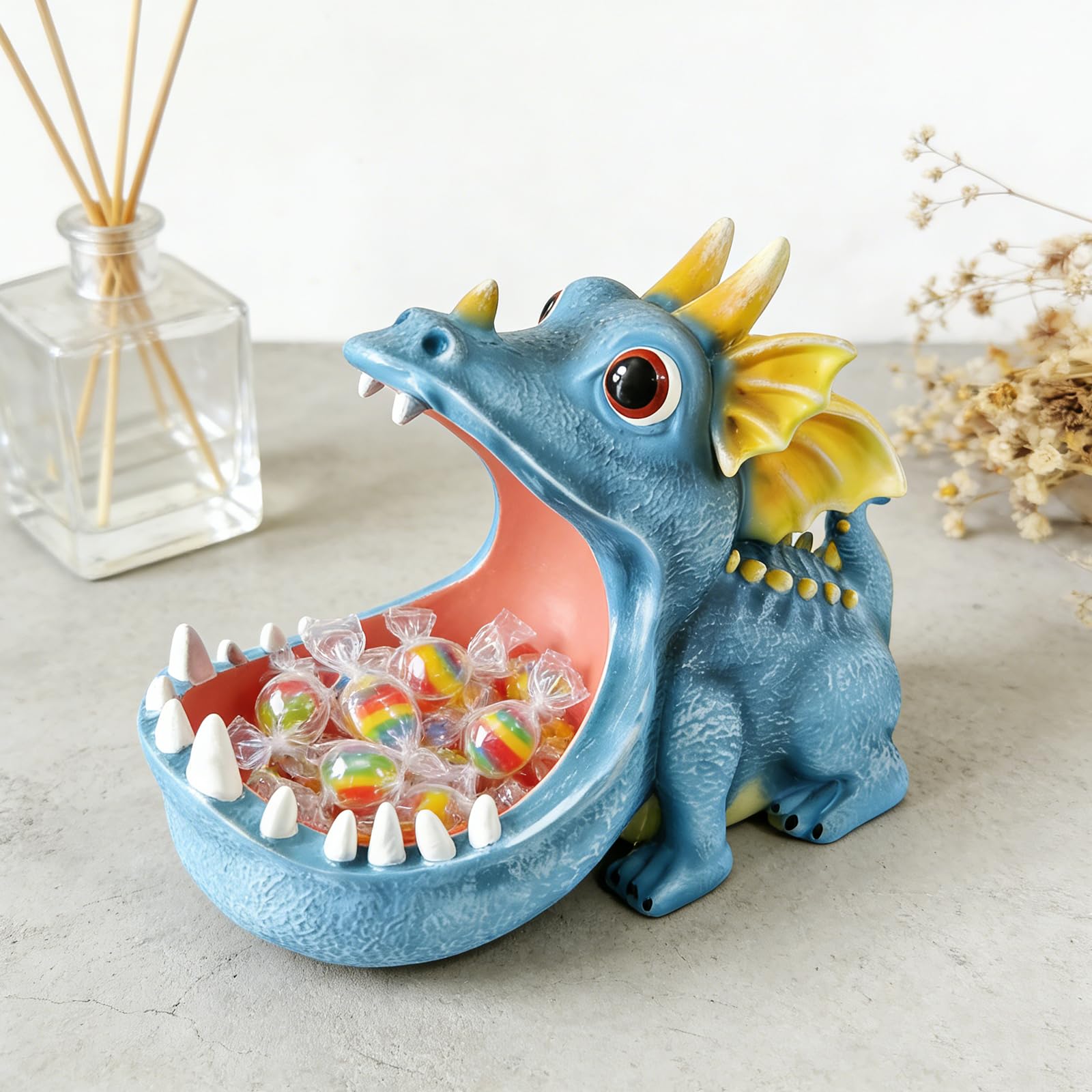 Dinosaur jewelry holder on nightstand