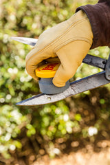 Coarse grit sharpening stone revives axes machetes and mower blades