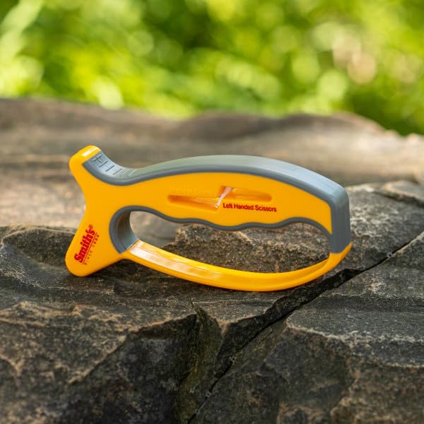 Floating ceramic rod adapts to scissors for precise sharpening left or right handed