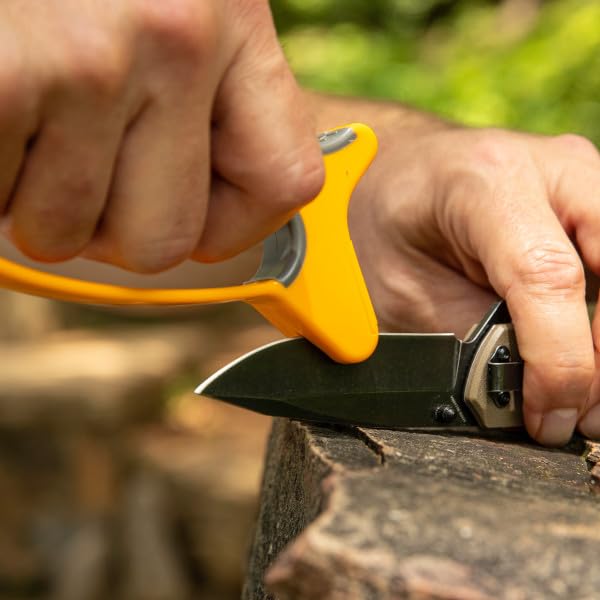 Full length finger guard and over molded handle for safe sharpening