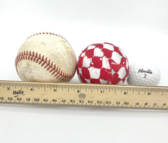white fabric christmas ball with red and grey snowflake pattern