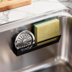 Sponge holder for kitchen sink with suction cups mounted on smooth surface