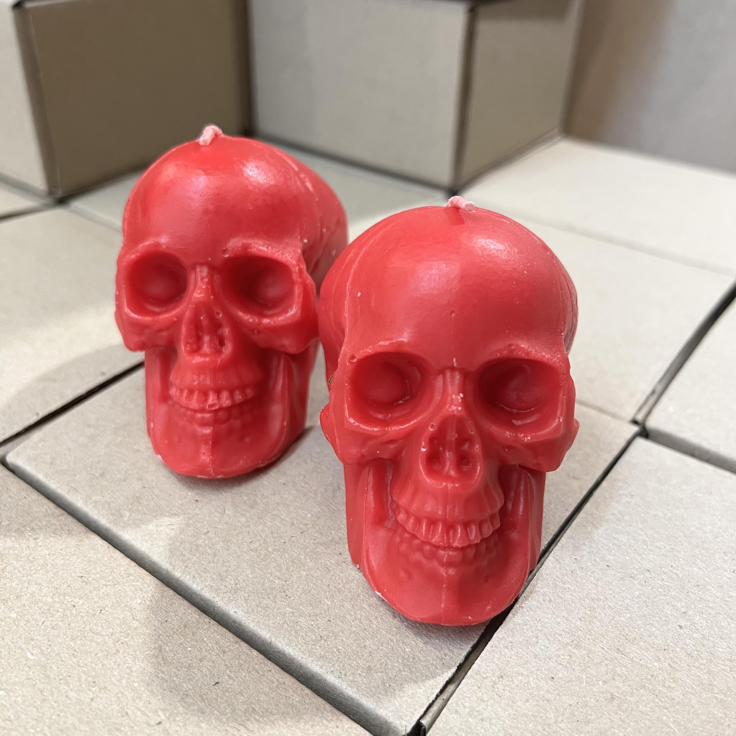 Spooky red skull candles for decorative rituals
