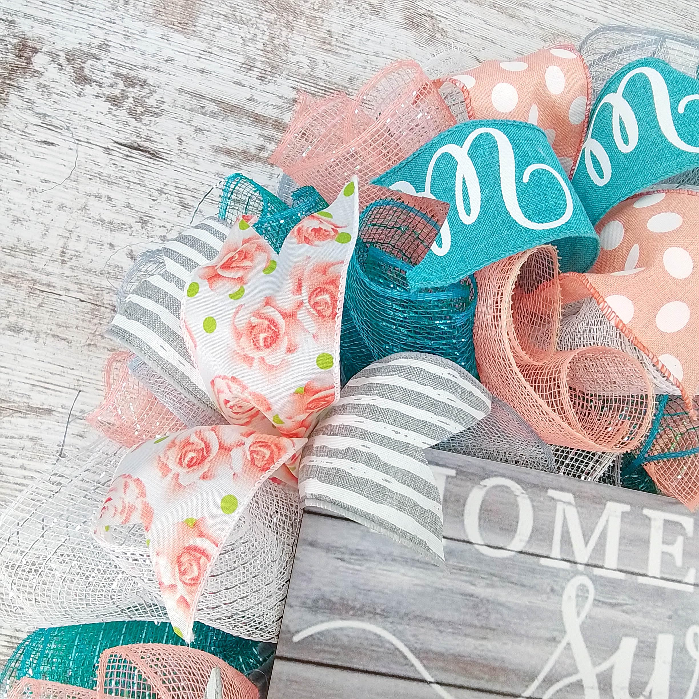 Spring color palette wreath coral grey teal white mesh close up