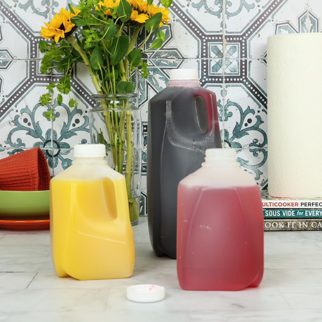 Squat plastic milk storage jugs with white lids
