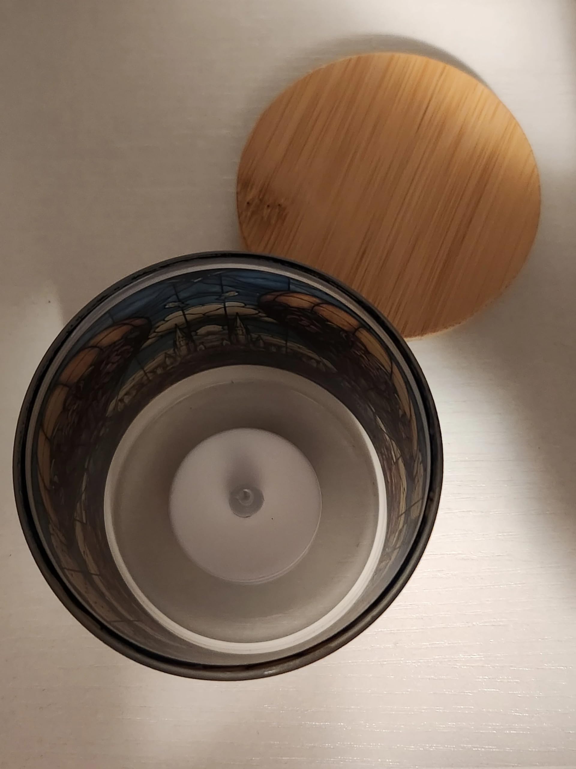 Battery operated tea light holder in glass jar with bamboo lid