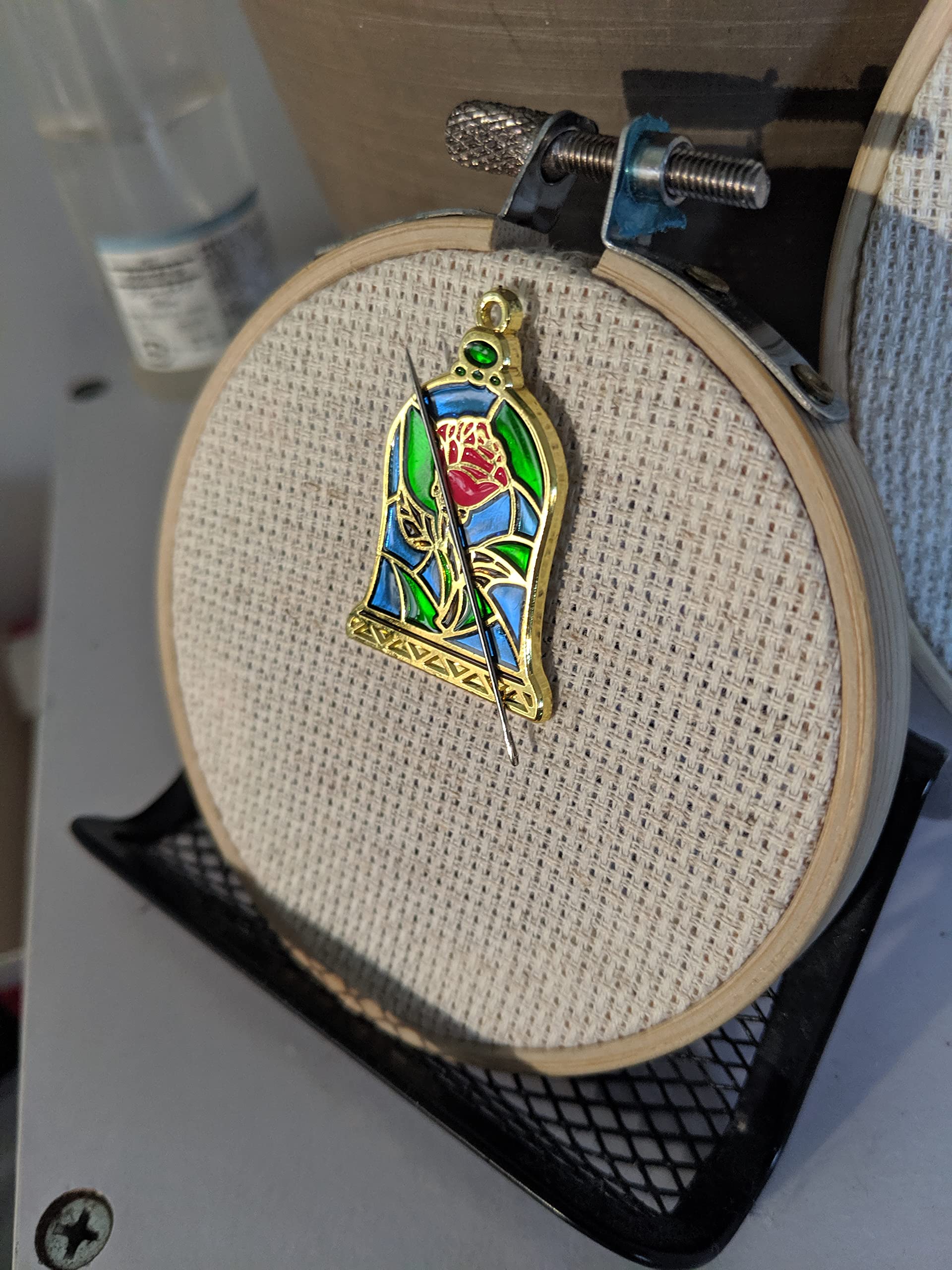 Magnets shown on Stained Glass Rose Needle Minder