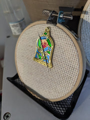 Magnets shown on Stained Glass Rose Needle Minder