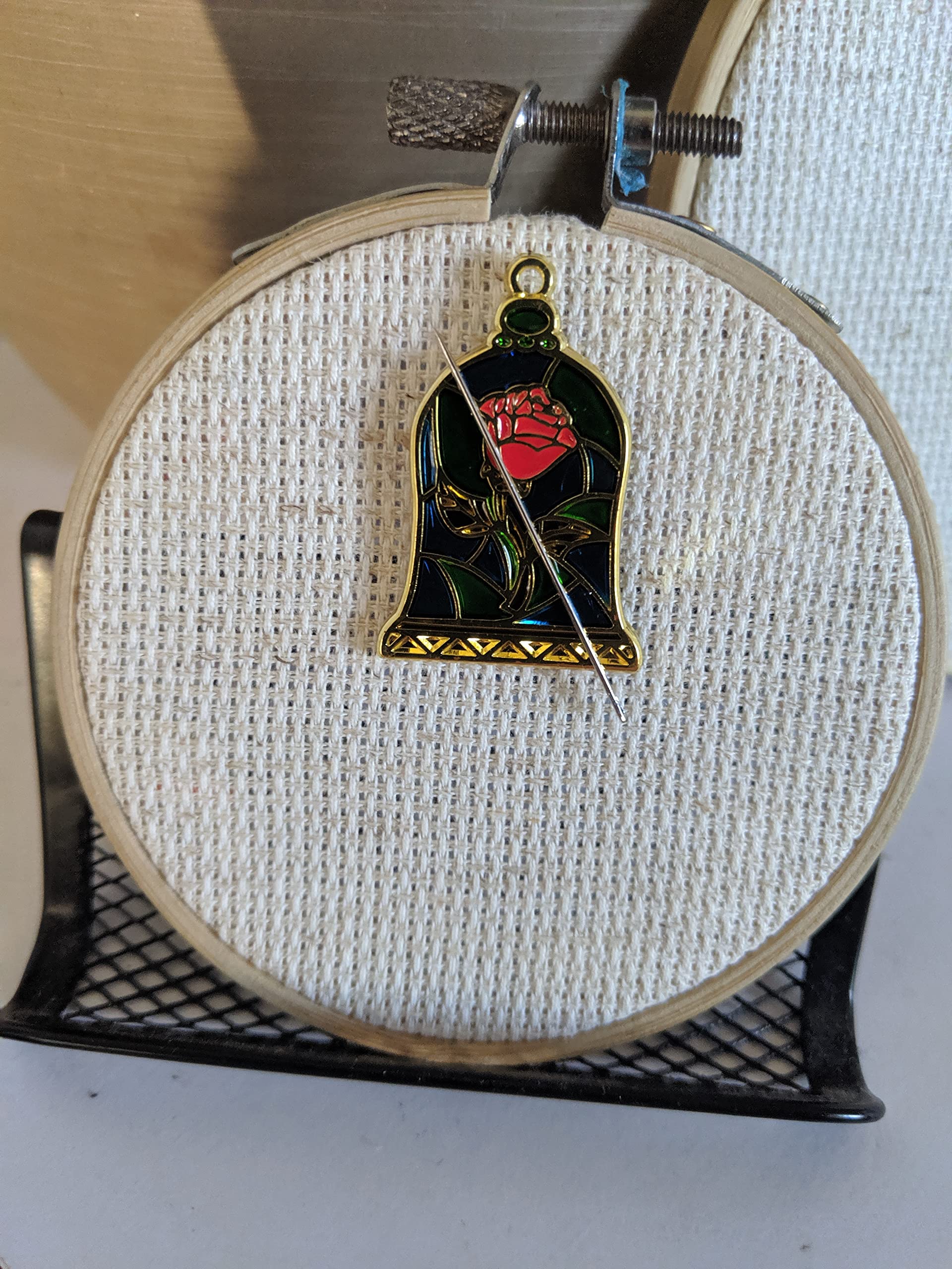 Stained Glass Rose Needle Minder with second magnet securing needle on hoop