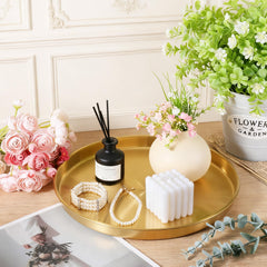 Three piece set gold round trays for jewelry perfume keys