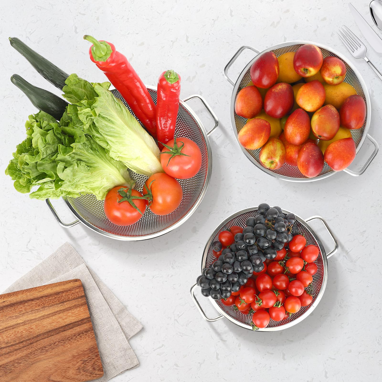 Perforated mesh colander with footed base for stability