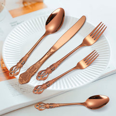 Vintage hollow relief flatware design in copper rose
