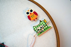 Pack of two needle minders size 1 inch