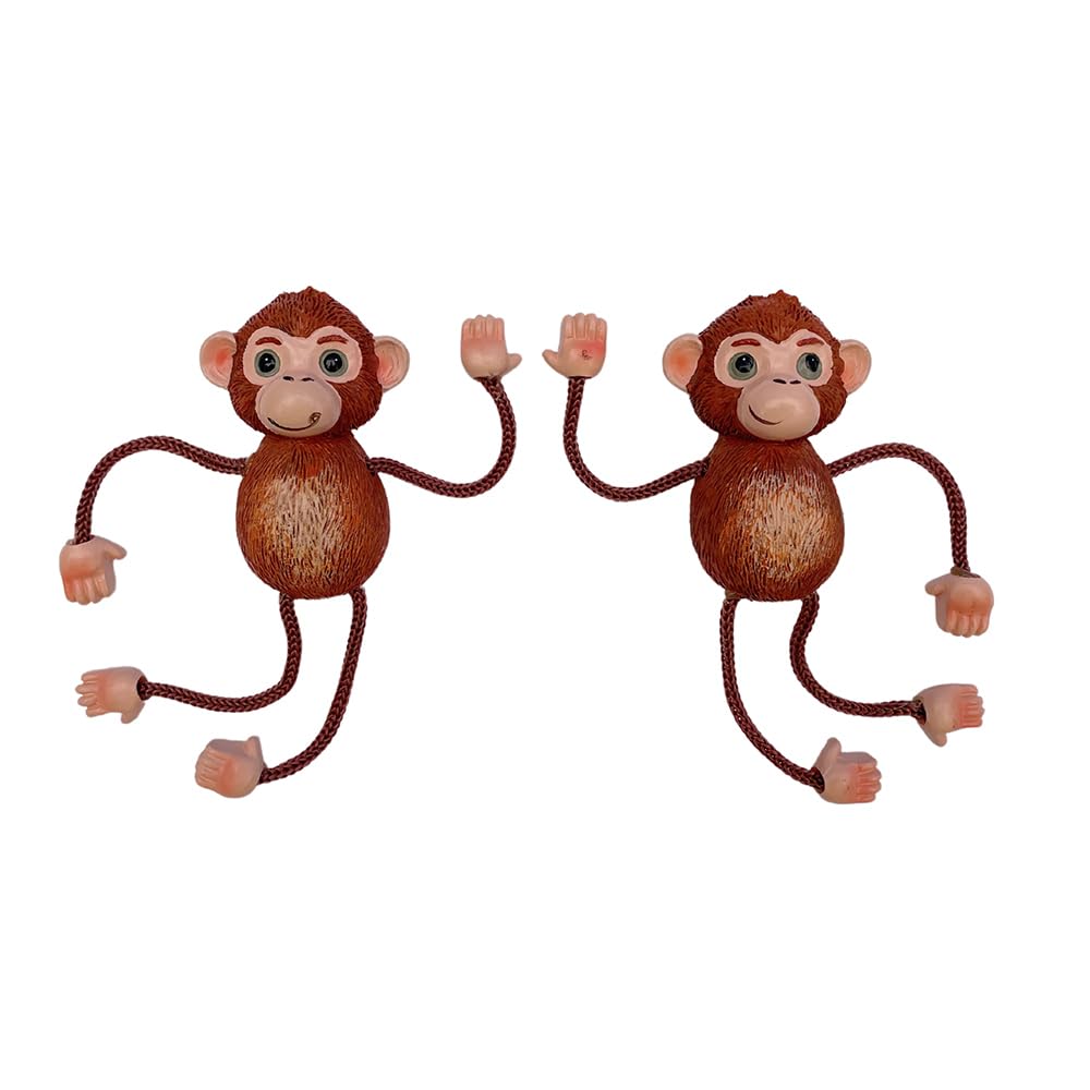 Monkeys hold photos lists and artwork on magnetic surfaces