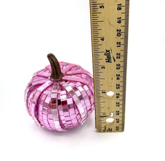 Lightweight styrofoam pumpkin covered in shimmering pink tiles