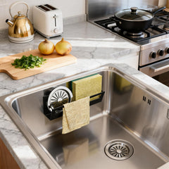 Adhesive hook and suction cup mounting for sink caddy