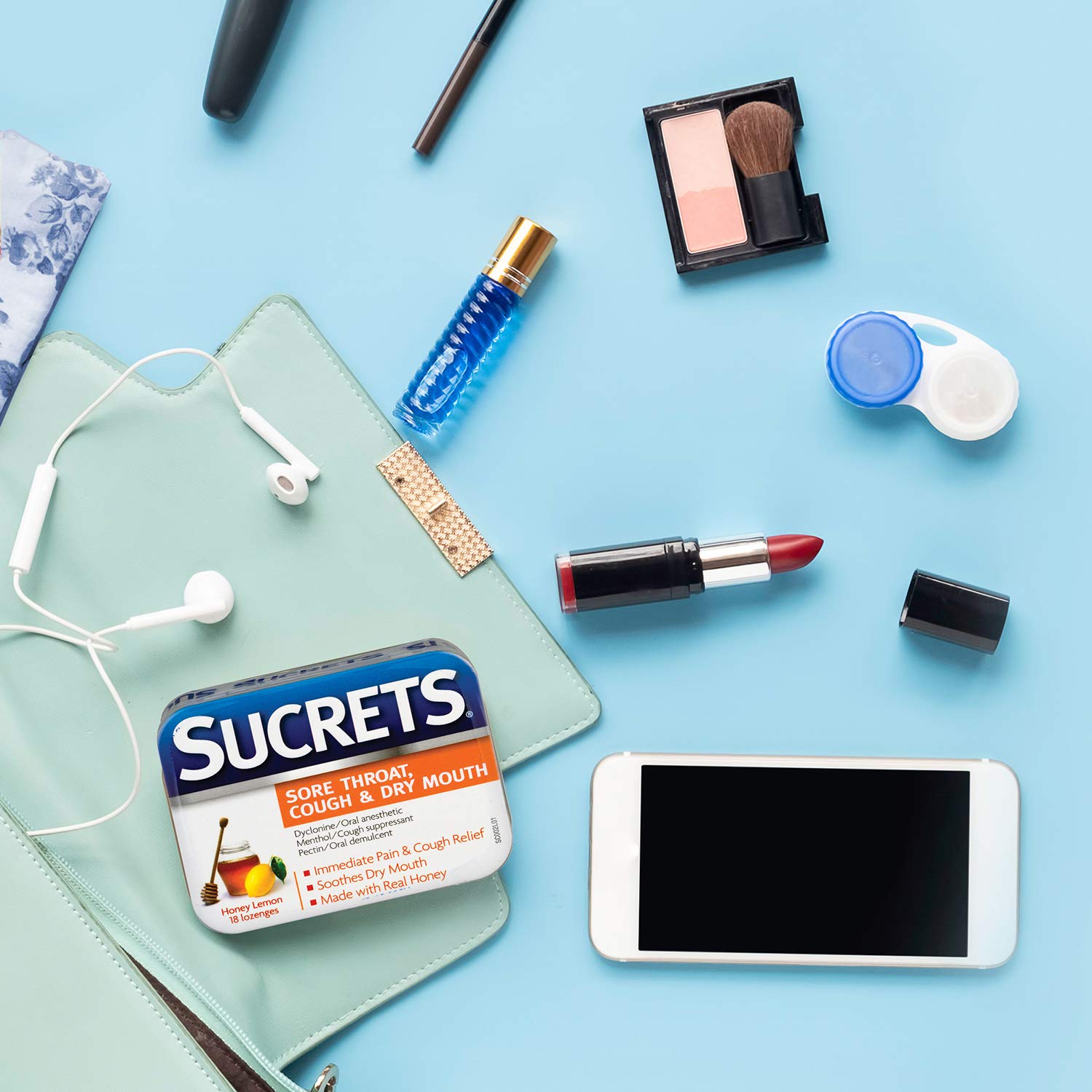 On-the-go travel tin with Sucrets lozenges