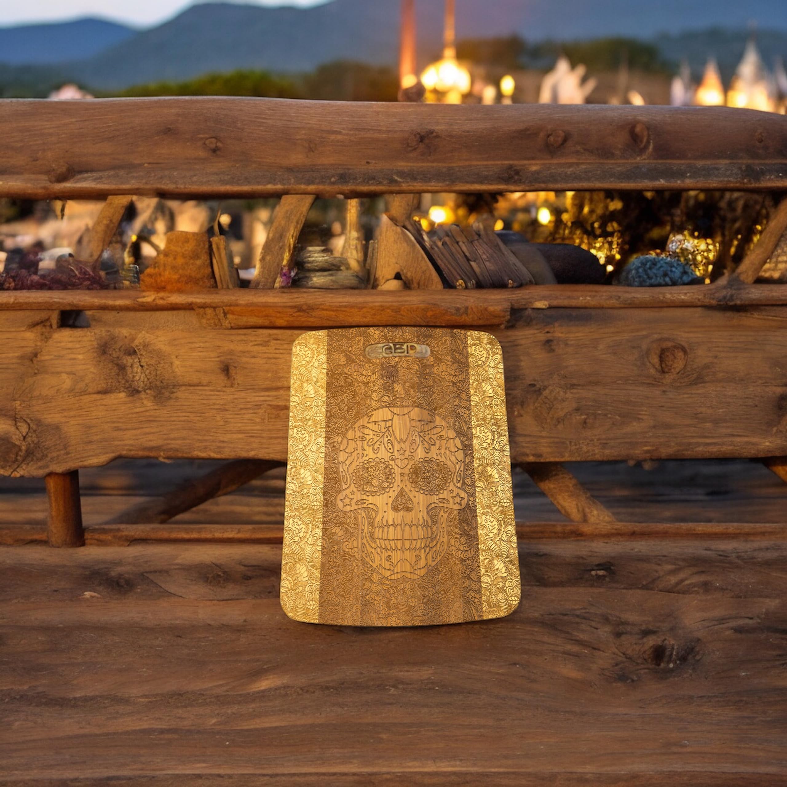 sugar skull motif on bamboo cutting board