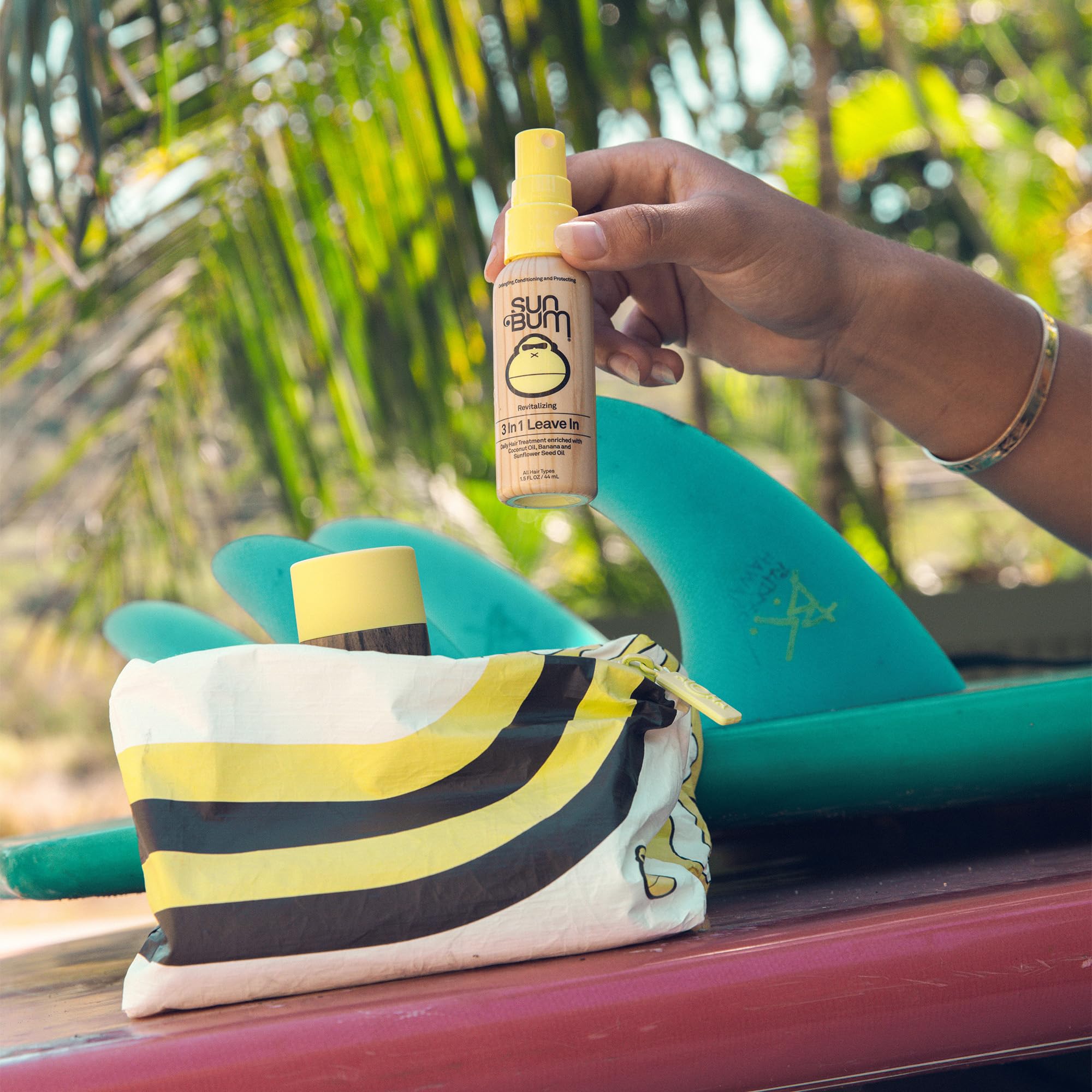 Sun Bum revitalizing shampoo bottle in travel kit