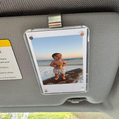 Magnetic frame between crystal-clear acrylic panels