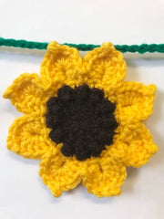 Close up of sunflower decor with yellow petals and brown centers