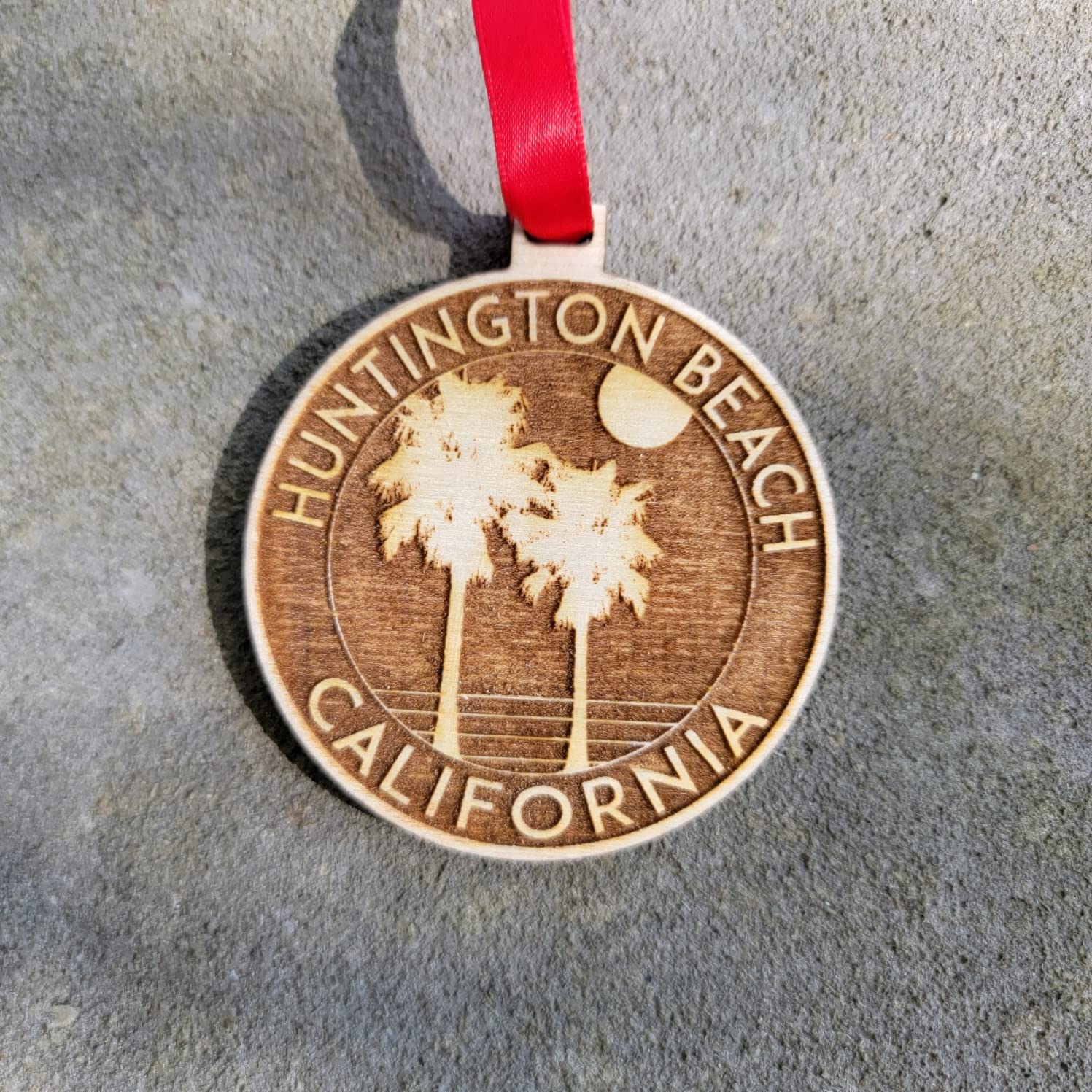 Decorative gifting bag included Huntington Beach ornament