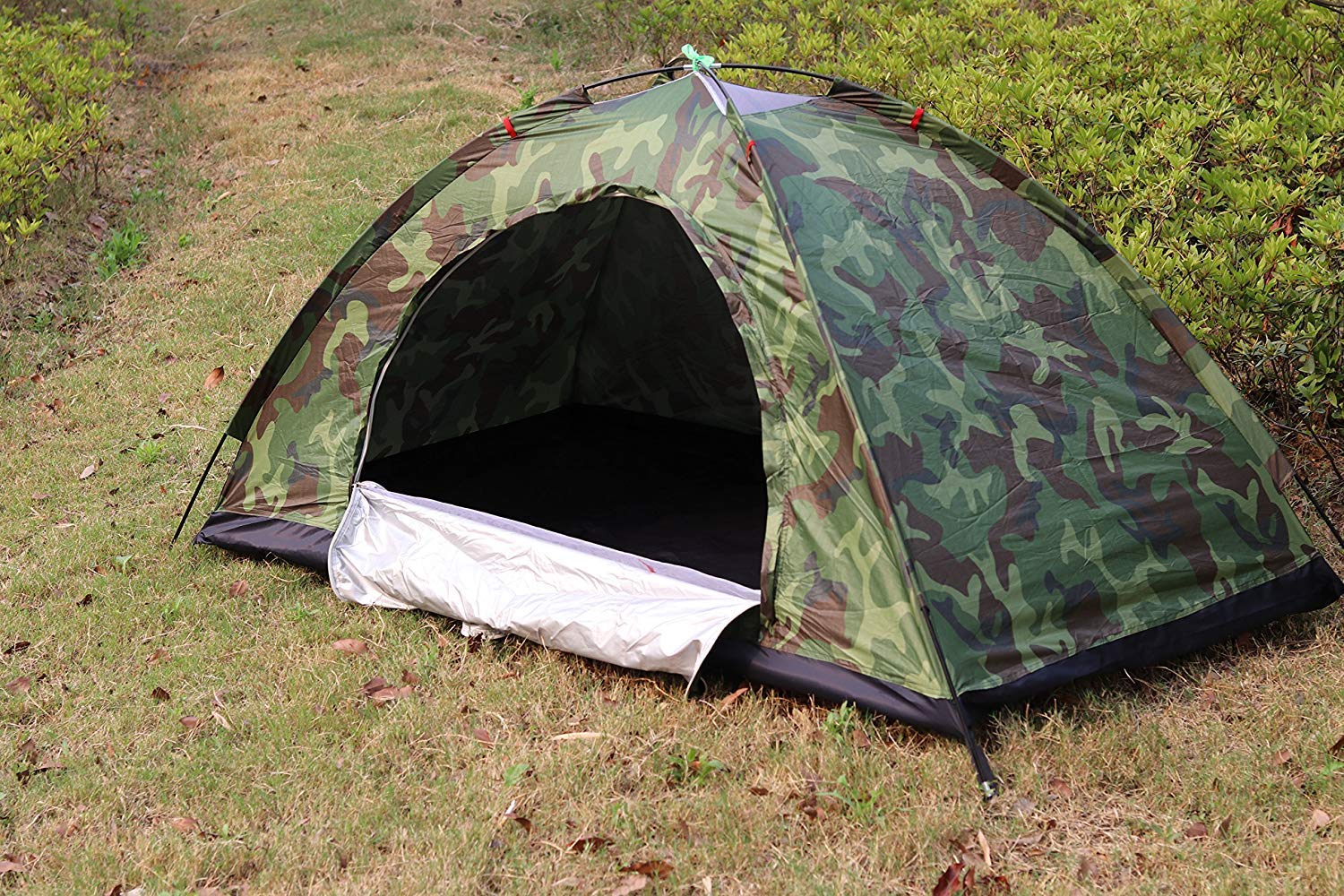 Tent contents including two poles four pegs storage bag