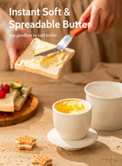 Soft butter visible inside butter dish on counter