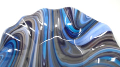 Artist's mark on bottom of glass bowl