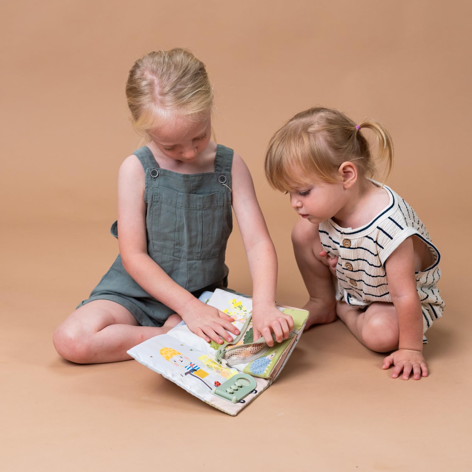 Compact Montessori busy book for toddlers travel