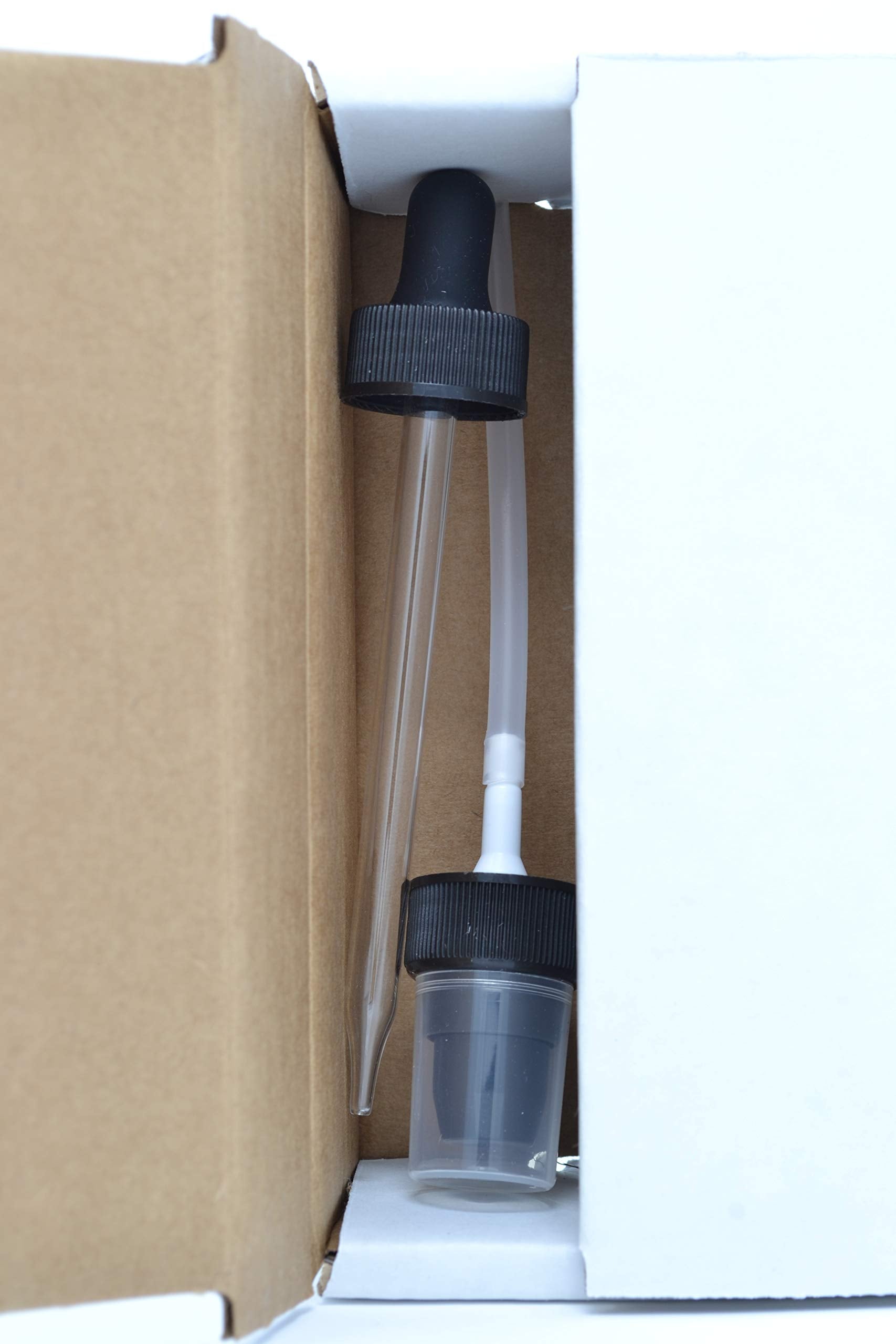 Tamanu Oil bottle with dropper applicator