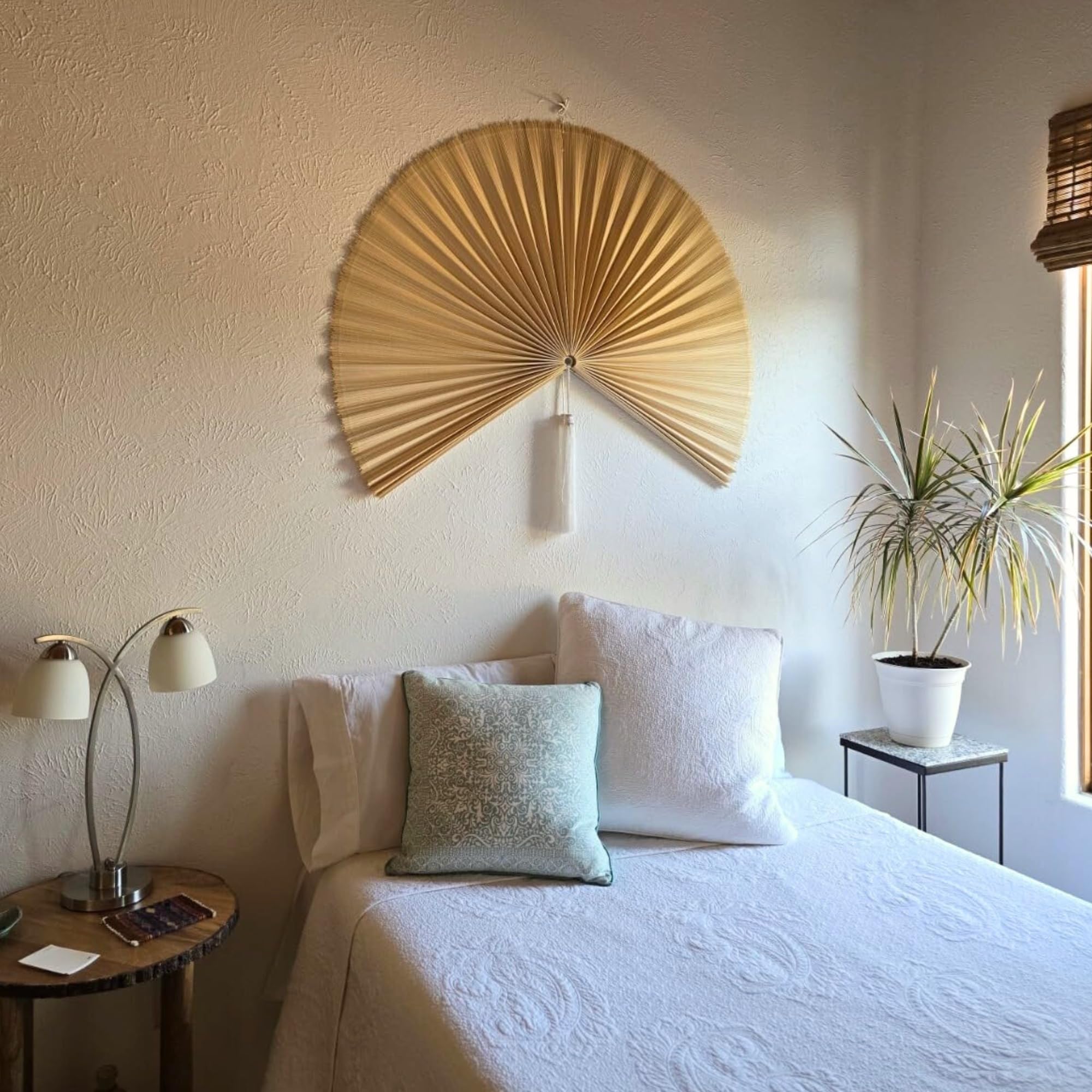 Soft synthetic tassels on decorative folding fan