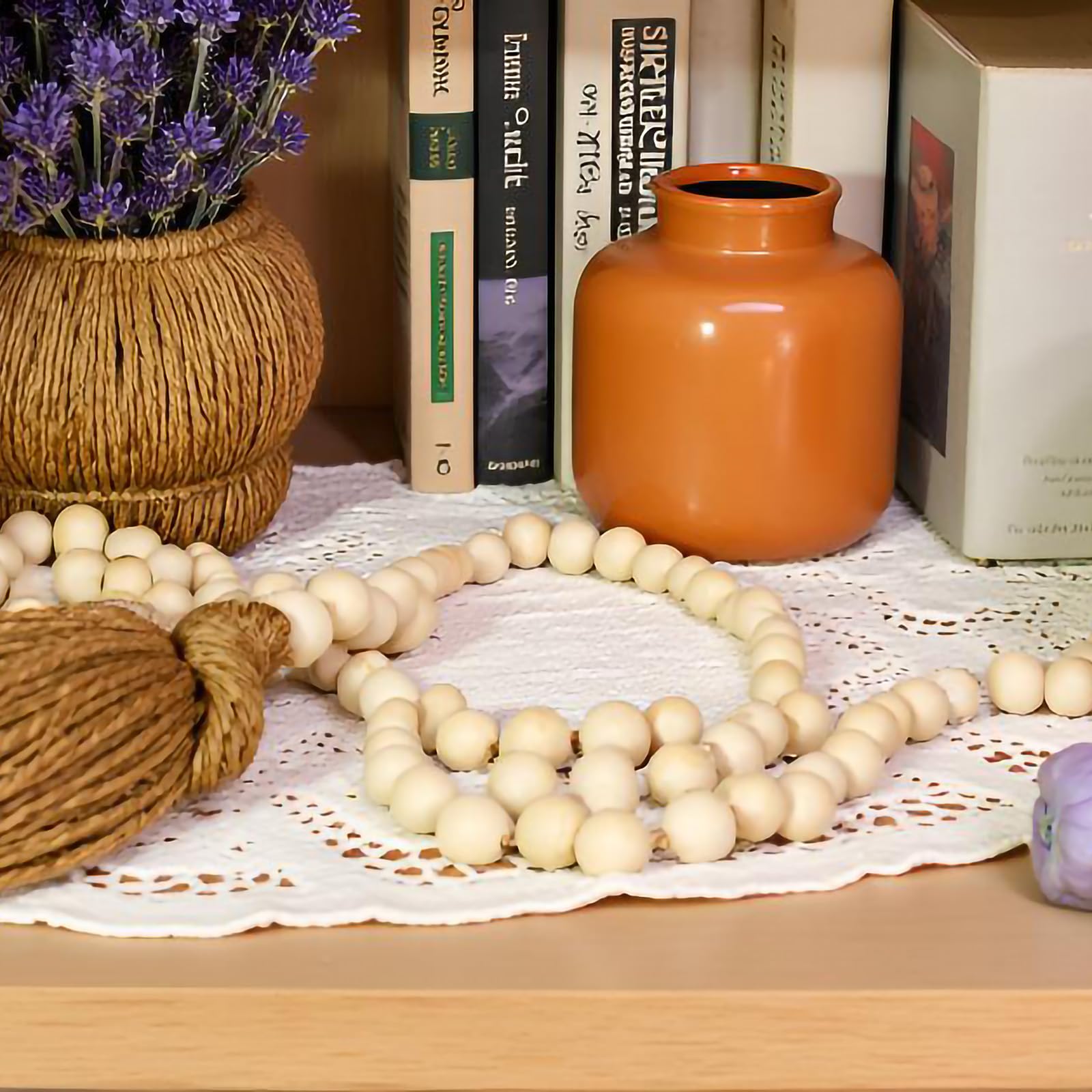 Bead garland draped on a shelf for rustic boho style