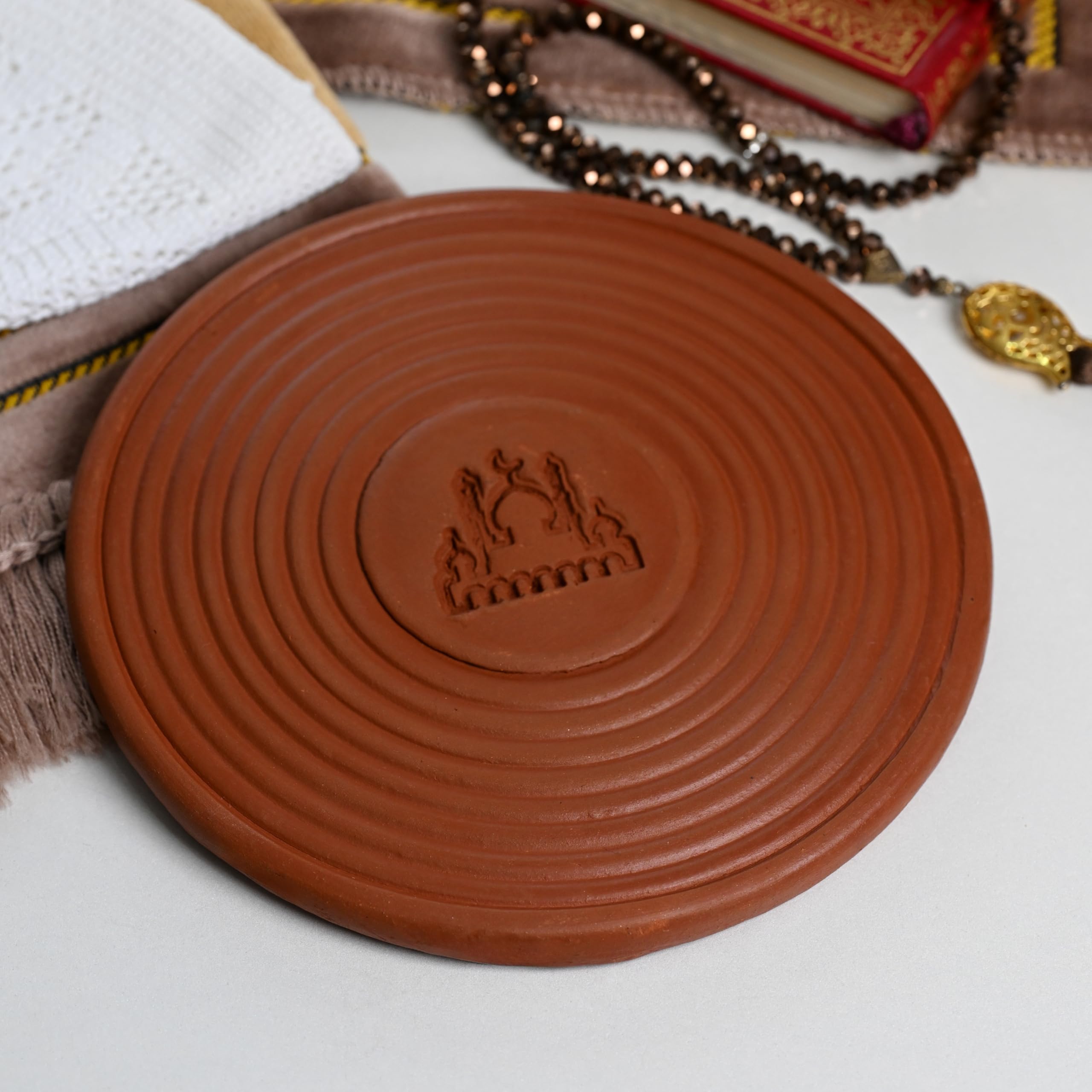 Mosque logo at center of Tayammum Stone