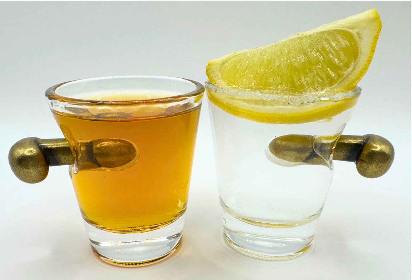 Two piece set of 2oz clear heavy-base glasses by TDS
