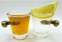 Two piece set of 2oz clear heavy-base glasses by TDS