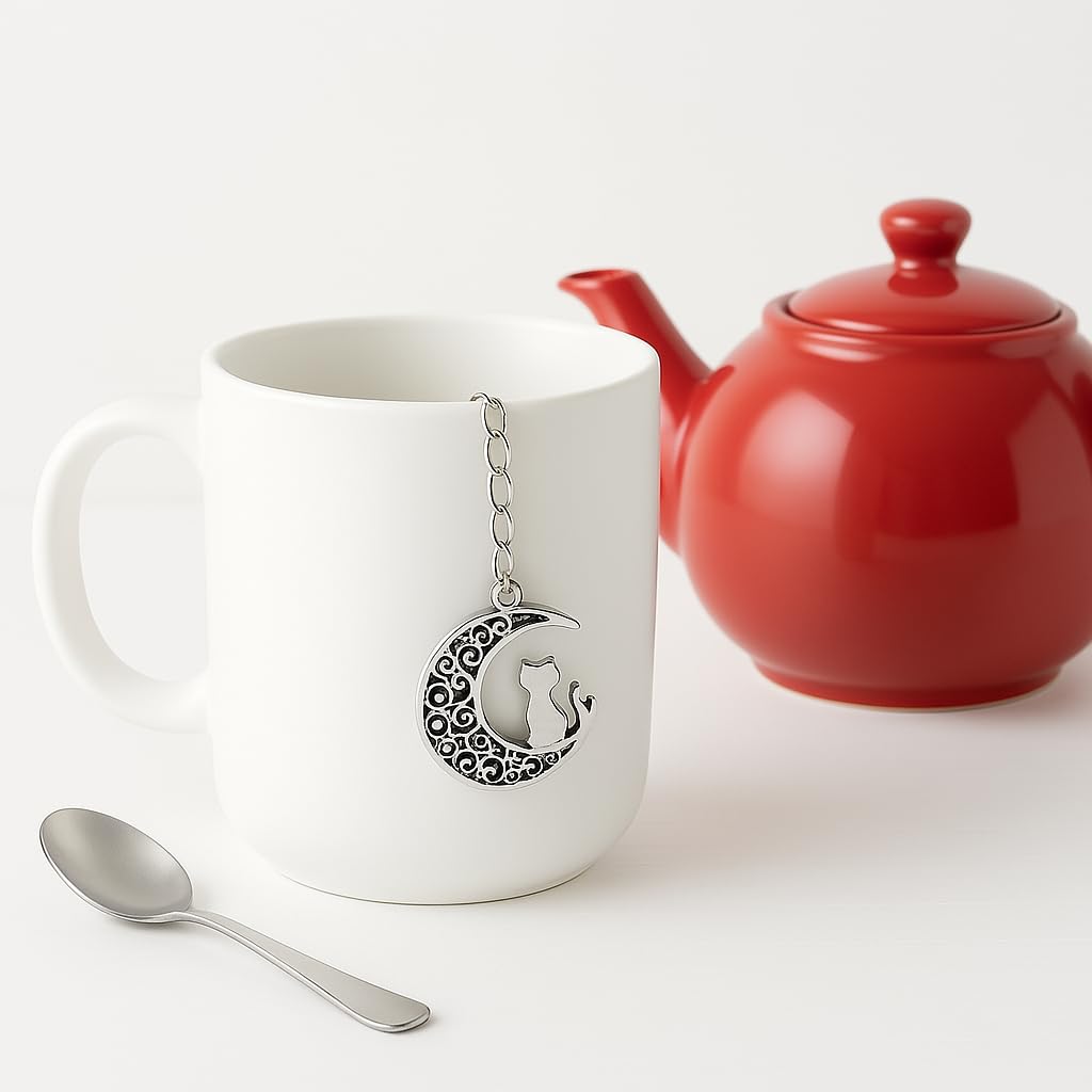Tea brewing in a cup with Moon Cat mesh ball infuser