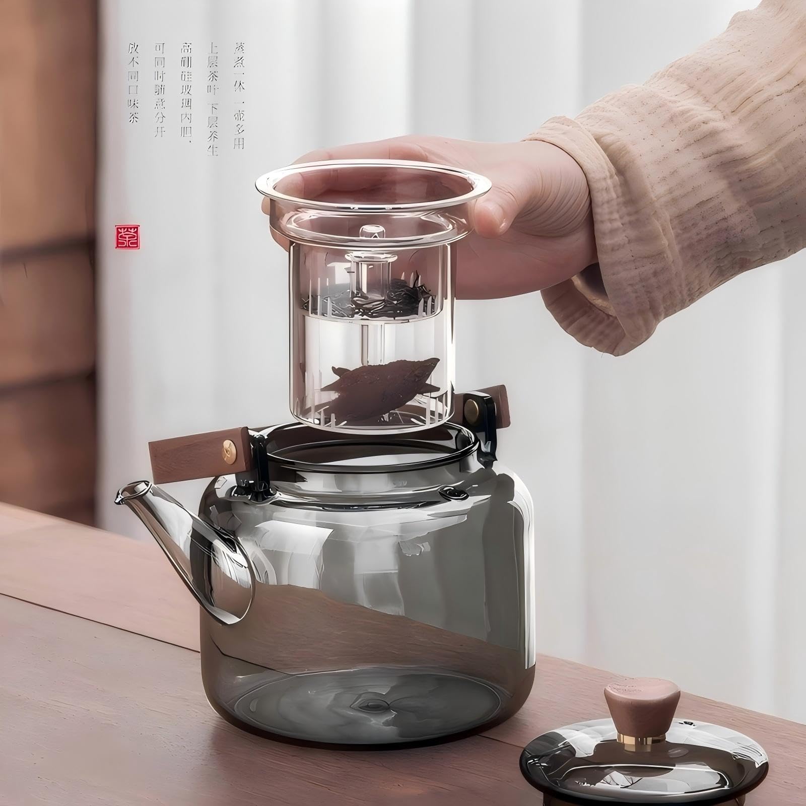 Removable infuser basket inside borosilicate teapot