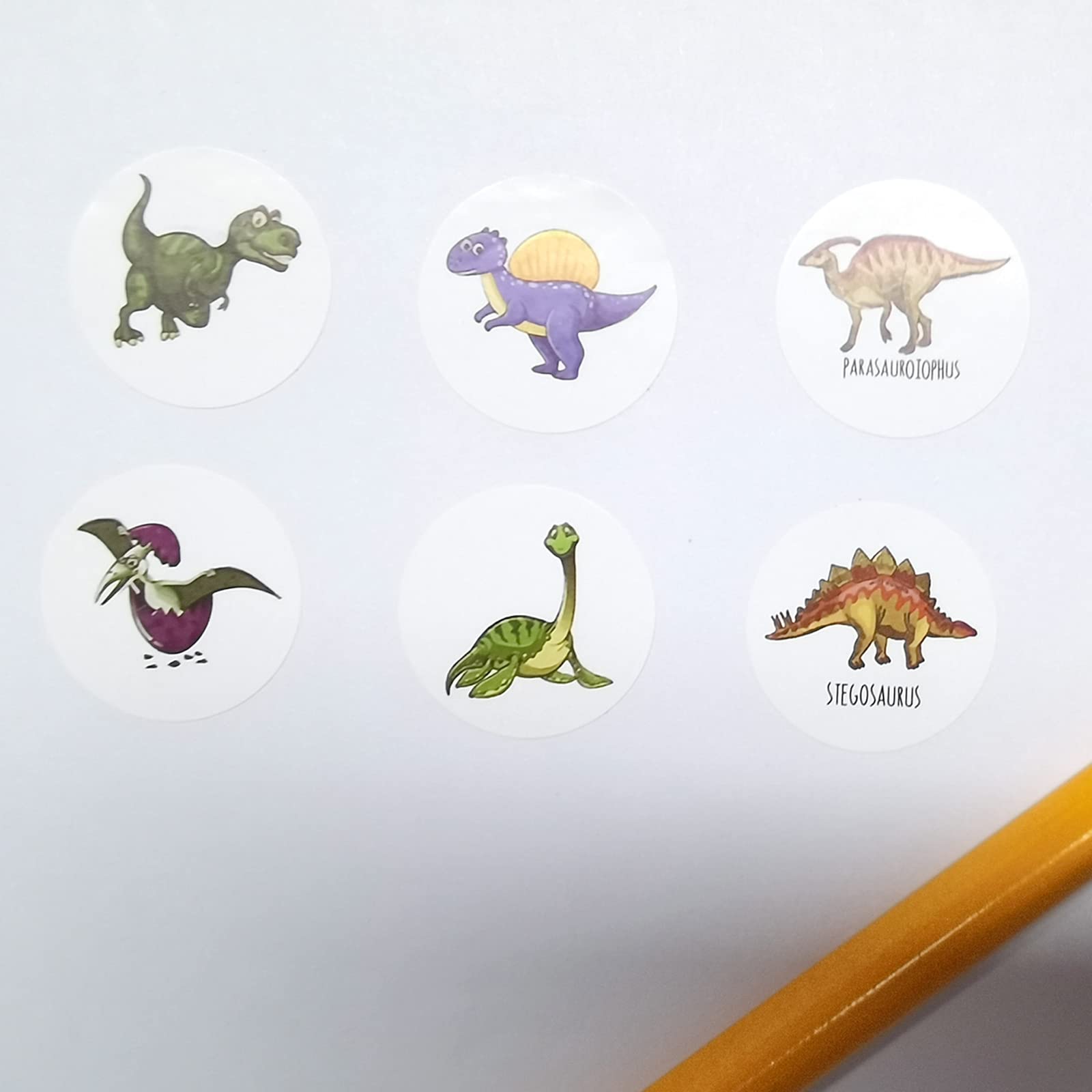 Roll of round dinosaur stickers for crafts and activities