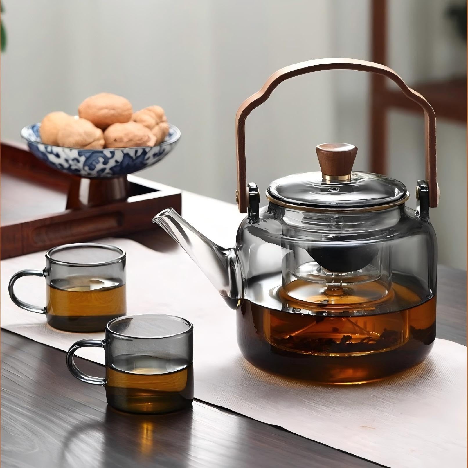 Elegant borosilicate glass teapot with infuser and wooden details