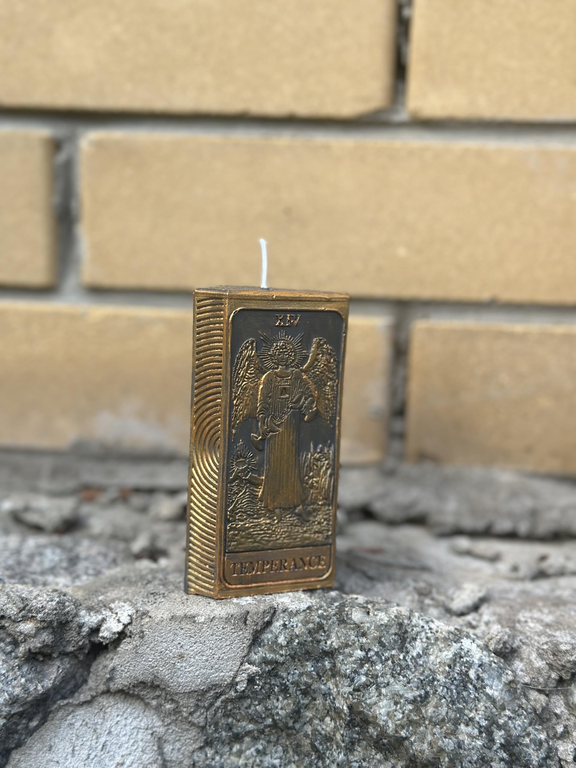 Finished candle sample using Temperance tarot card candle mold image