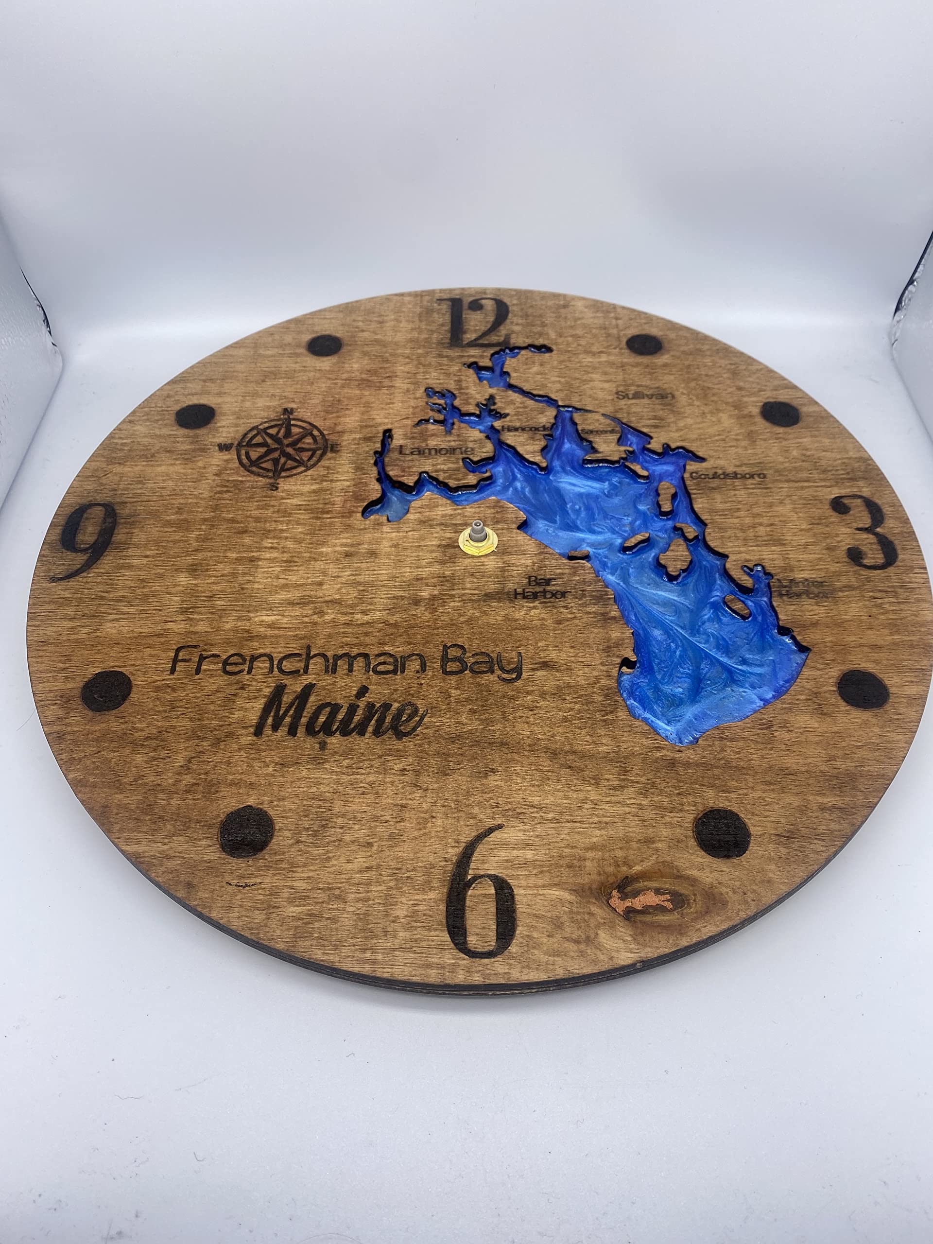 Handmade clock assembled by Sooner Tide Creations team