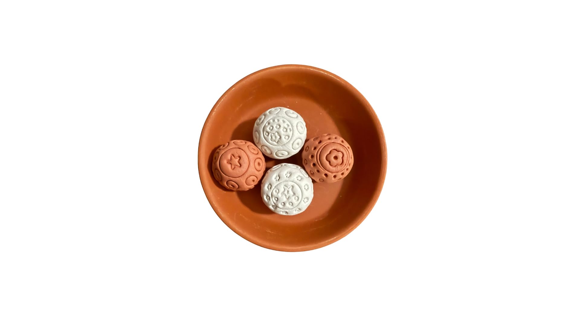Terracotta diffuser stones on plate 4.5 inches diameter