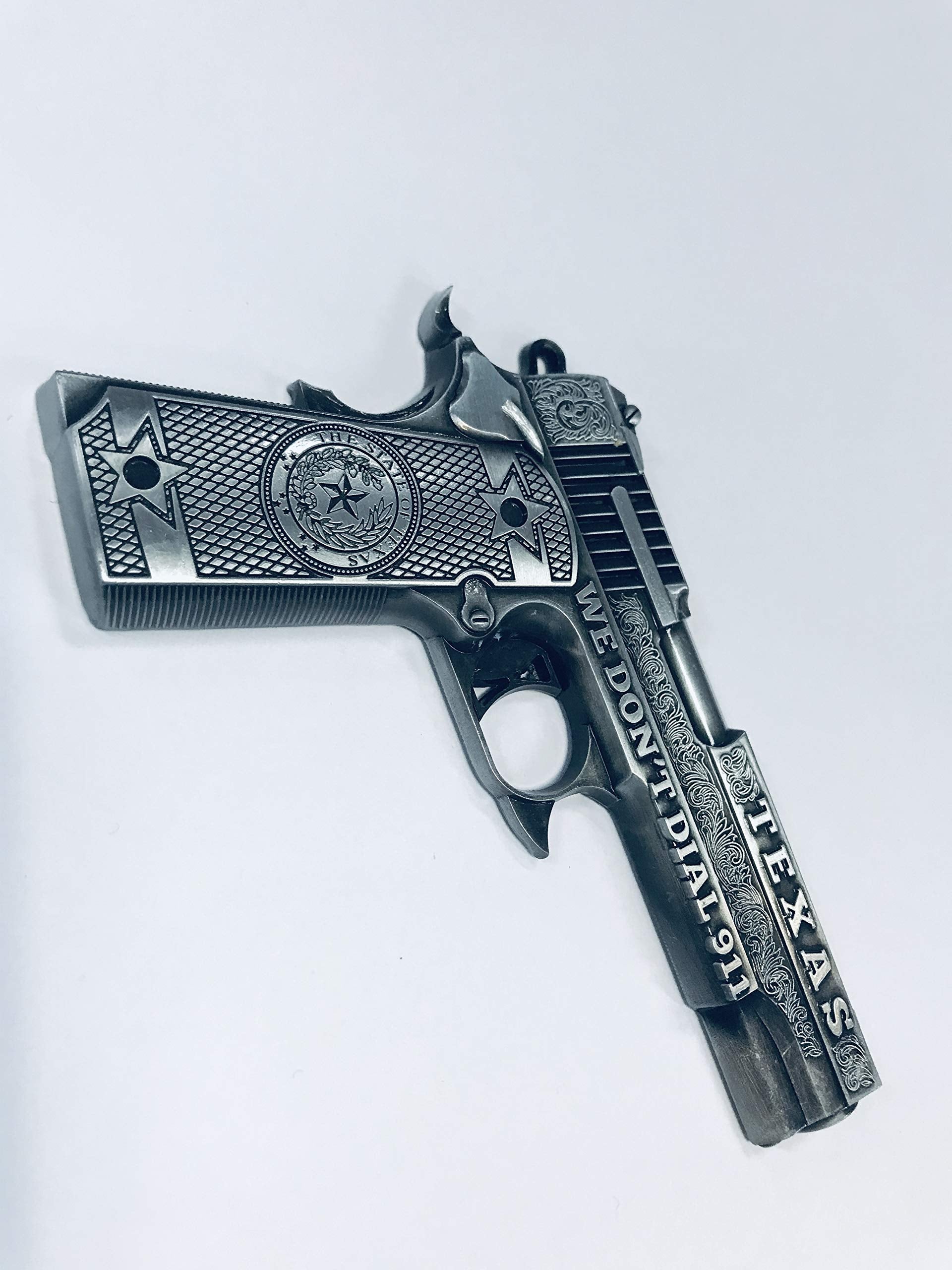 Pistol shaped metal magnet with Texas print