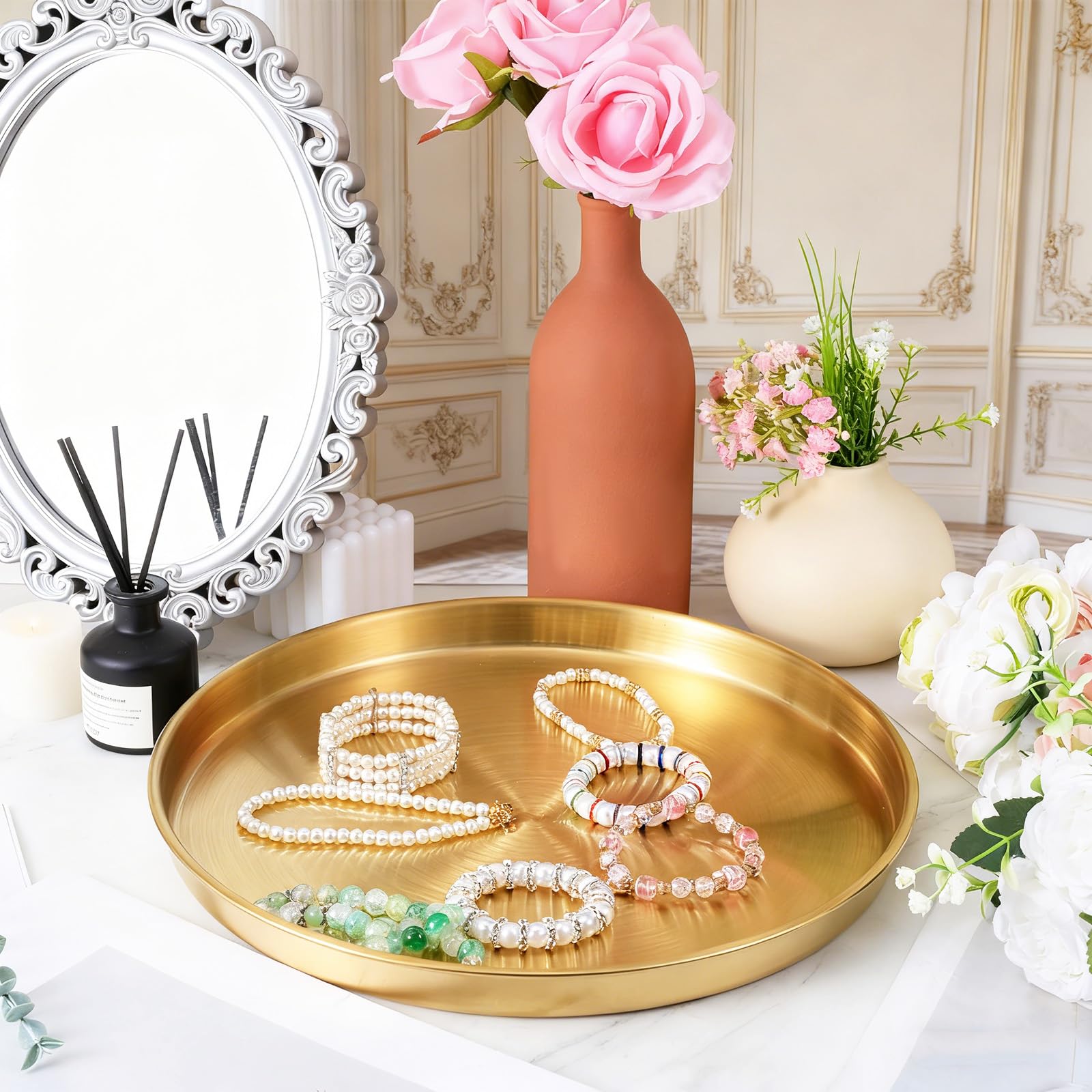 Packaged in a bag with three gold round trays
