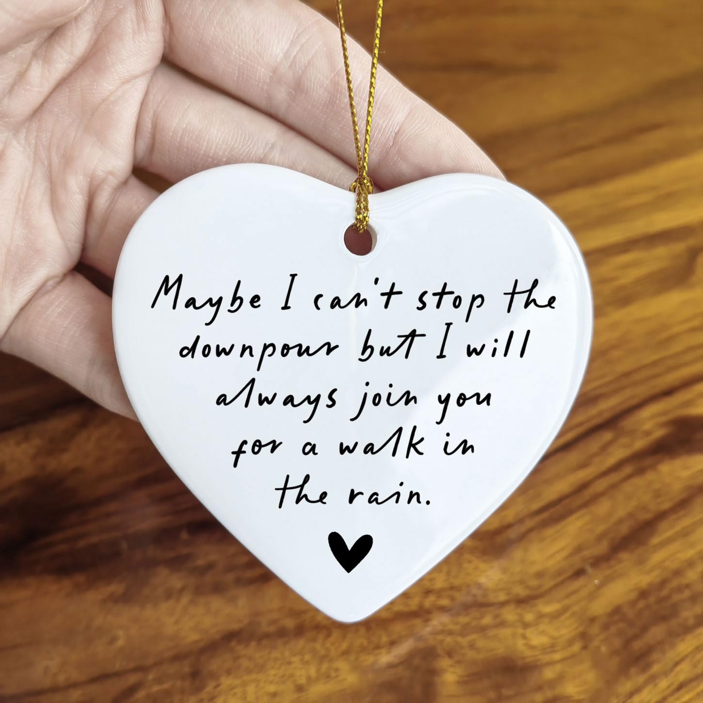 Two-sided print visible on Maybe I Can't Stop The Downpour ornament