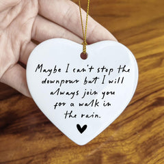 Two-sided print visible on Maybe I Can't Stop The Downpour ornament