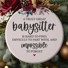 Gift ready ornament with red and gold ribbons