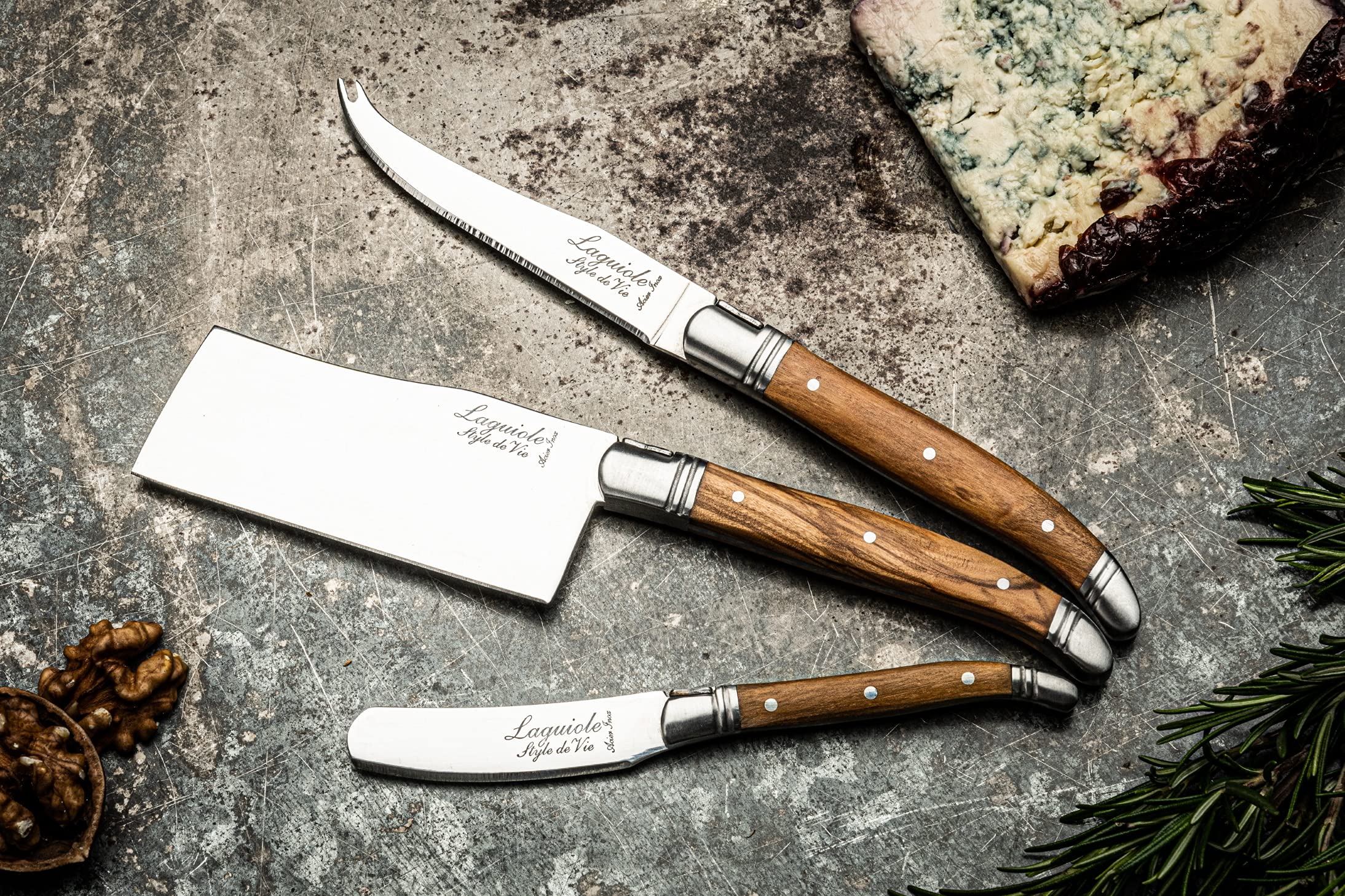 Olive wood and stainless steel cheese knives detail